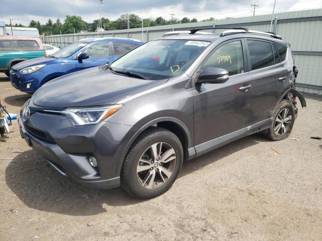 Photo 2 from auction – 2016 TOYOTA RAV4 XLE with VIN JTMWFREV8GJ081688