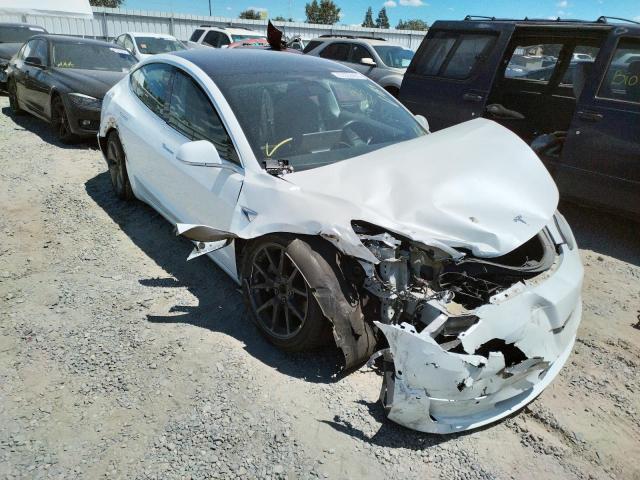 TESLA MODEL 3 2018 with VIN 5YJ3E1EB9JF066984 - Photo from auction