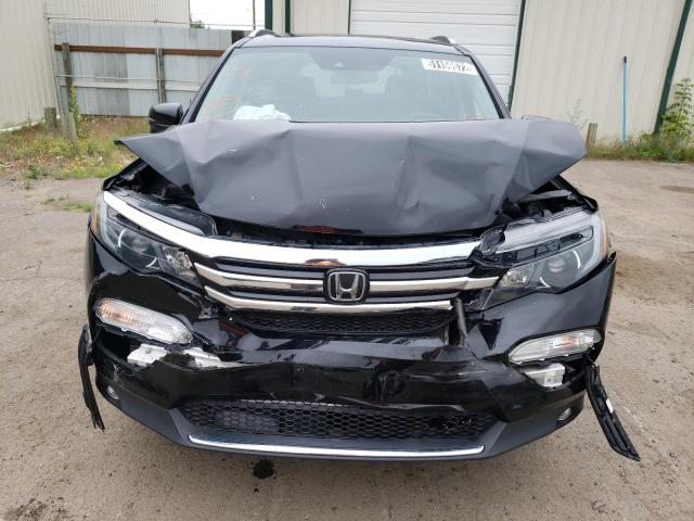 Photo 9 from auction – 2017 HONDA PILOT TOUR with VIN 5FNYF5H98HB016168