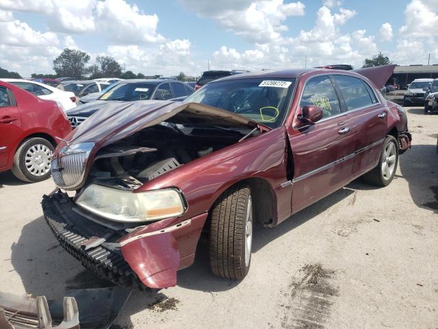 Photo 2 from auction – 2003 LINCOLN TOWN CAR E with VIN 1LNHM81W13Y660848