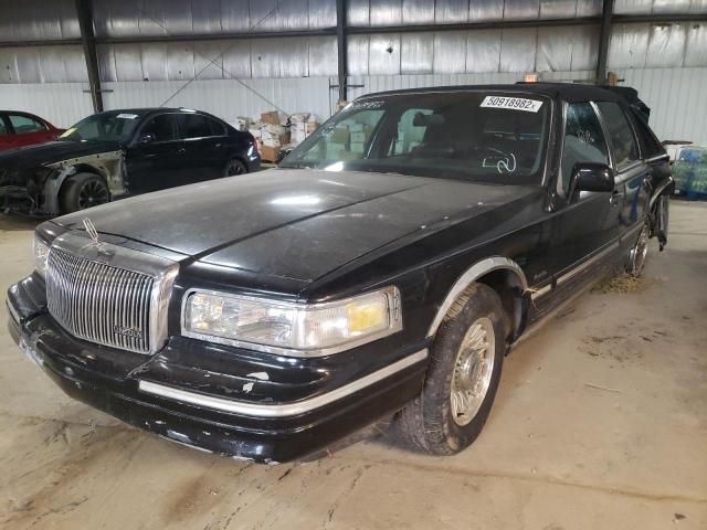 Photo 2 from auction – 1997 LINCOLN TOWN CAR E with VIN 1LNLM81W8VY720878