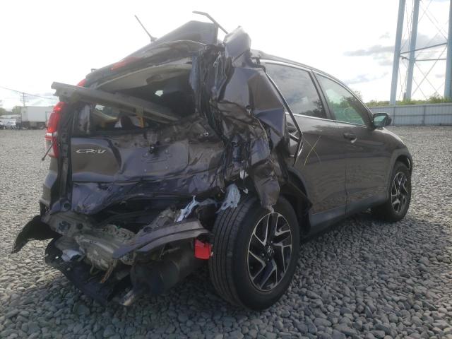 Photo 4 from auction – 2016 HONDA CR-V SE with VIN 2HKRM4H49GH682741