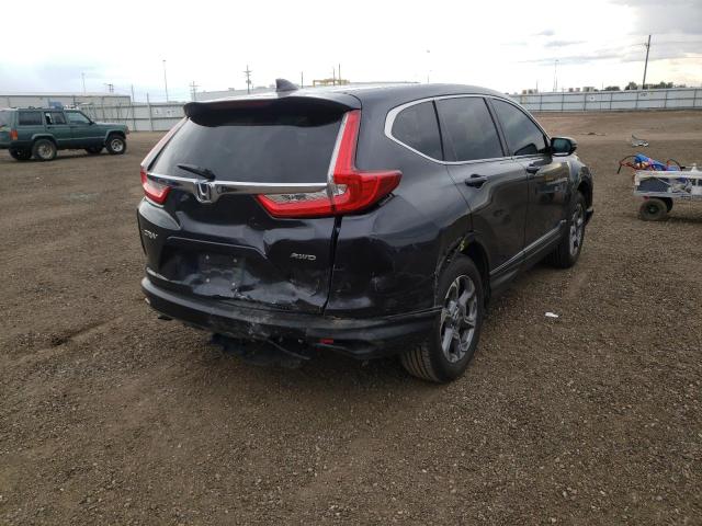 Photo 4 from auction – 2017 HONDA CR-V with VIN 2HKRW2H84HH631036