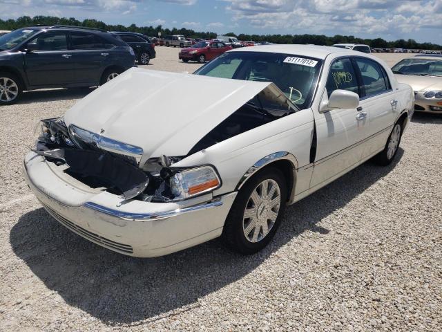 Photo 2 from auction – 2004 LINCOLN TOWNCAR with VIN 1LNHM83W24Y636203