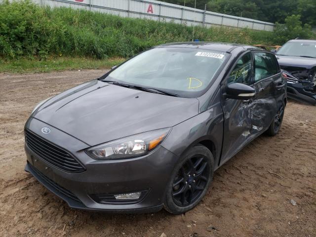 Photo 2 from auction – 2015 FORD FOCUS SE with VIN 1FADP3K29FL359650