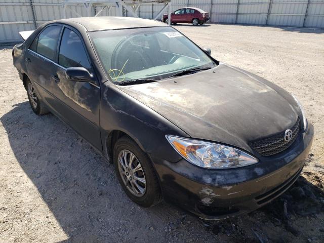 TOYOTA CAMRY LE 2003 with VIN JTDBE32K530174001 - Photo from auction