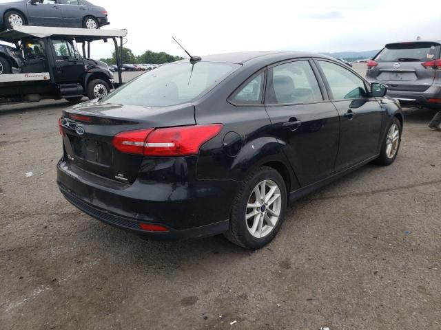 Photo 4 from auction – 2016 FORD FOCUS SE with VIN 1FADP3F22GL290764