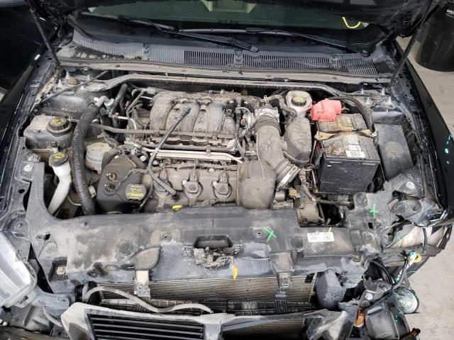 Photo 7 from auction – 2014 FORD TAURUS SEL with VIN 1FAHP2E8XEG124578