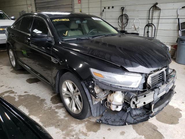 FORD TAURUS SEL 2014 with VIN 1FAHP2E8XEG124578 - Photo from auction