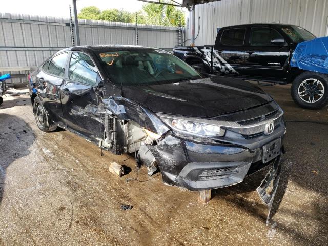 HONDA CIVIC LX 2018 with VIN 2HGFC2F55JH567013 - Photo from auction