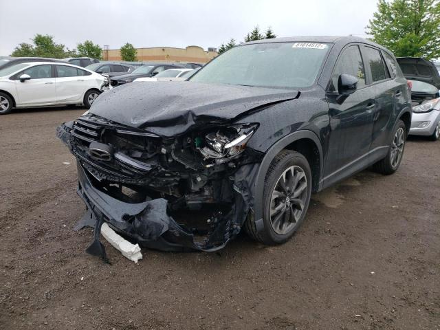 Photo 2 from auction – 2016 MAZDA CX-5 GT with VIN JM3KE4DY1G0804651