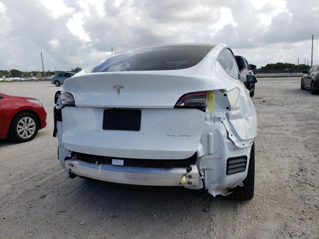 Photo 9 from auction – 2022 TESLA MODEL Y with VIN 7SAYGDEE5NF331503