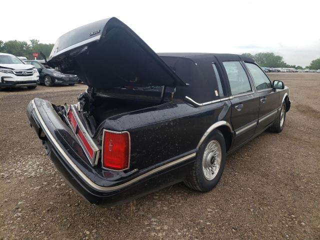 Photo 4 from auction – 1997 LINCOLN TOWN CAR E with VIN 1LNLM81W8VY720878
