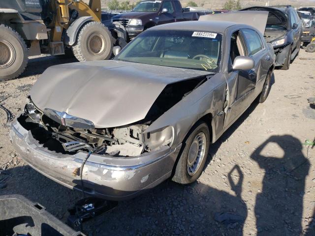 Photo 2 from auction – 2001 LINCOLN TOWN CAR E with VIN 1LNHM81W91Y654079