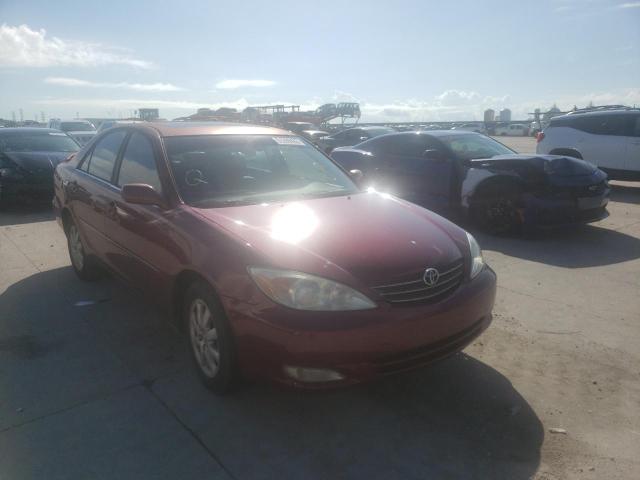 TOYOTA CAMRY LE 2004 with VIN JTDBF30K140154152 - Photo from auction