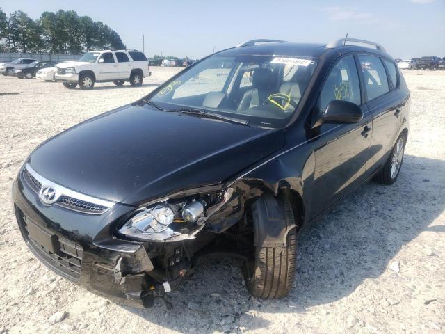 Photo 2 from auction – 2012 HYUNDAI ELANTRA TO with VIN KMHDC8AE5CU147635