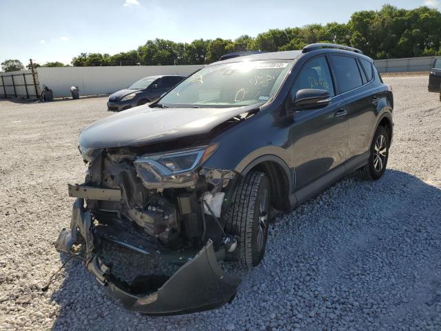 Photo 2 from auction – 2017 TOYOTA RAV4 XLE with VIN 2T3RFREVXHW581948
