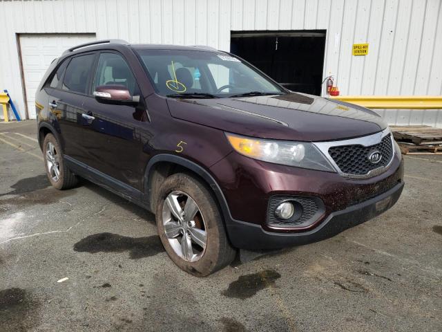 KIA SORENTO EX 2013 with VIN 5XYKU3A61DG326780 - Photo from auction