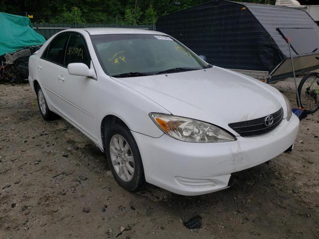 TOYOTA CAMRY LE 2004 with VIN 4T1BE32K84U282506 - Photo from auction