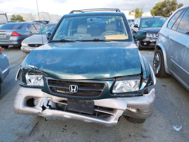 Photo 9 from auction – 2000 HONDA PASSPORT E with VIN 4S6DM58W1Y4418957