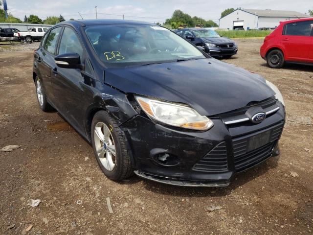 FORD FOCUS SE 2014 with VIN 1FADP3K27EL285093 - Photo from auction