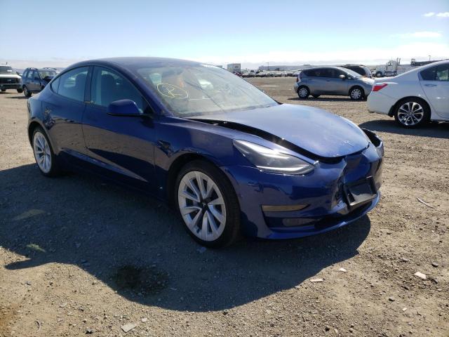 TESLA MODEL 3 2022 with VIN 5YJ3E1EB6NF142585 - Photo from auction