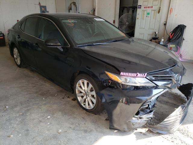 TOYOTA CAMRY LE 2020 with VIN 4T1C11AK2LU979030 - Photo from auction