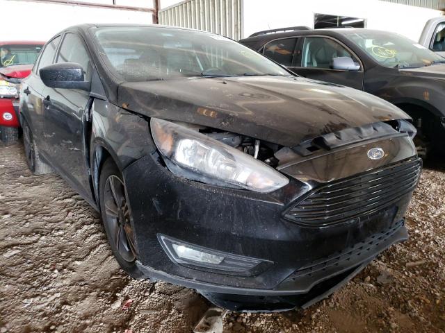 FORD FOCUS SE 2018 with VIN 1FADP3FE9JL292769 - Photo from auction