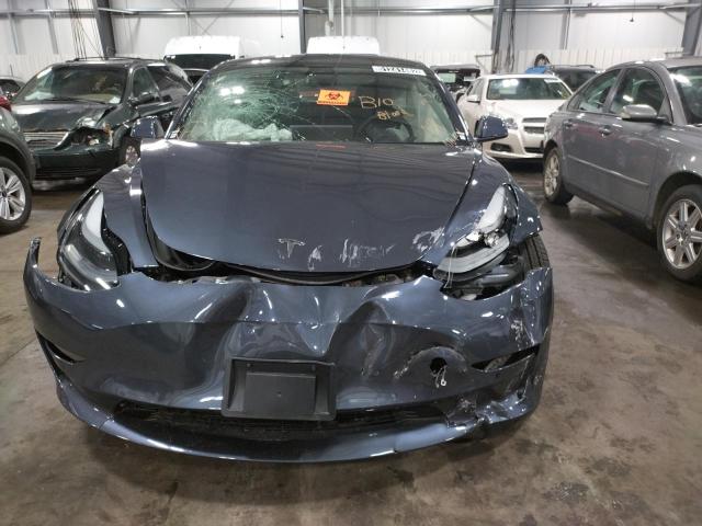 Photo 9 from auction – 2022 TESLA MODEL 3 with VIN 5YJ3E1EB8NF185468