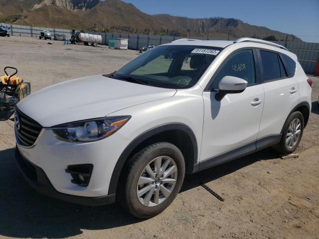 Photo 2 from auction – 2016 MAZDA CX-5 TOURI with VIN JM3KE2CY3G0866848