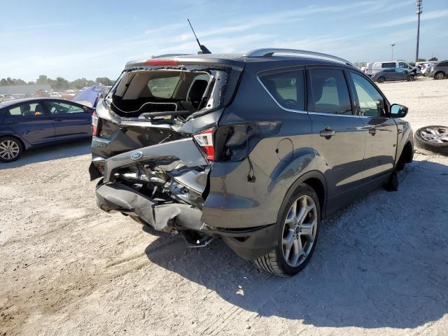 Photo 4 from auction – 2018 FORD ESCAPE TIT with VIN 1FMCU9J93JUB43291