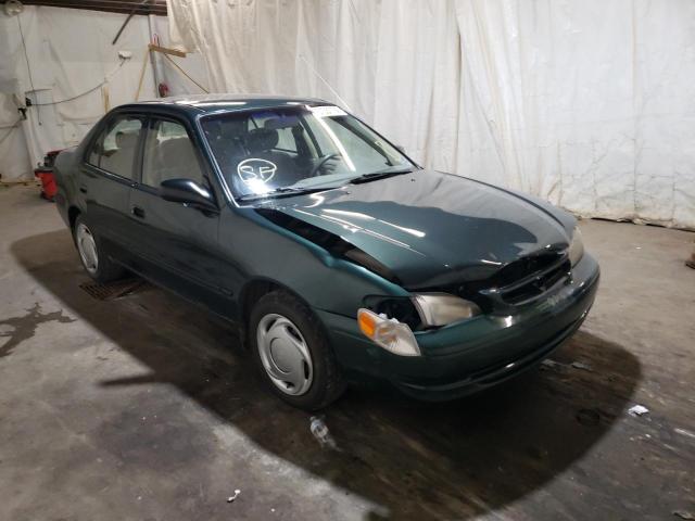 TOYOTA COROLLA VE 2000 with VIN 2T1BR12E8YC263934 - Photo from auction