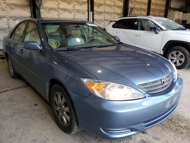 TOYOTA CAMRY LE 2002 with VIN JTDBF30K420019728 - Photo from auction