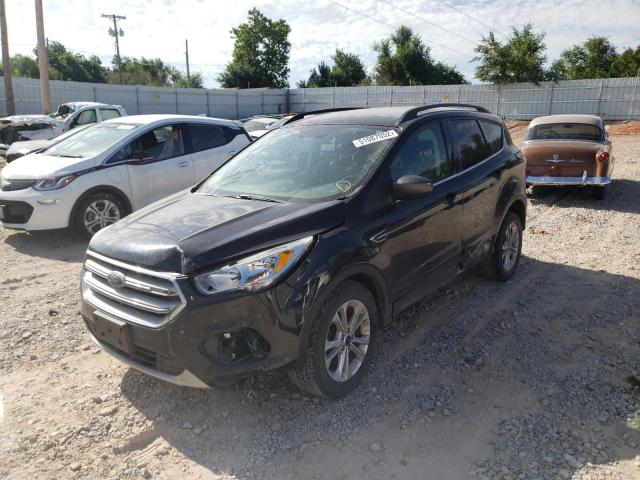 Photo 2 from auction – 2018 FORD ESCAPE SE with VIN 1FMCU0GD0JUA11807