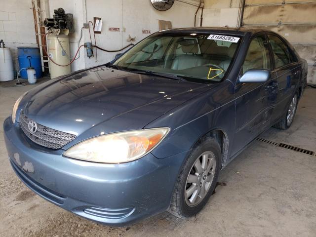 Photo 2 from auction – 2002 TOYOTA CAMRY LE with VIN JTDBF30K420019728
