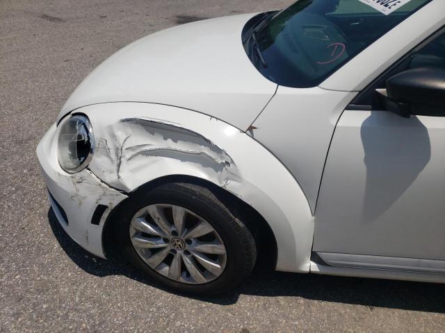 Photo 9 from auction – 2013 VOLKSWAGEN BEETLE with VIN 3VWFP7AT9DM667379