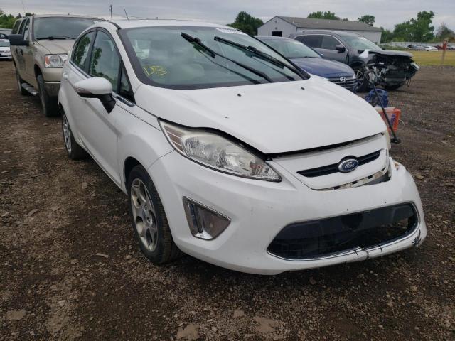 FORD FIESTA SES 2011 with VIN 3FADP4FJ8BM111616 - Photo from auction