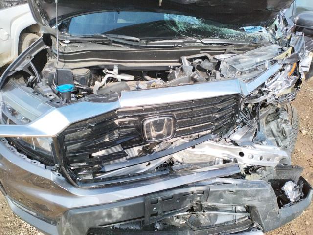 Photo 7 from auction – 2022 HONDA RIDGELINE with VIN 5FPYK3F70NB017805