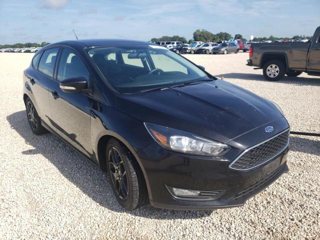 FORD FOCUS SE 2015 with VIN 1FADP3K29FL366856 - Photo from auction