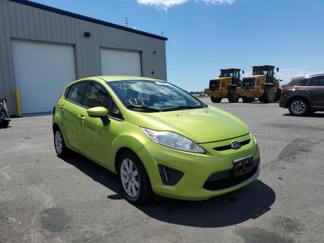 FORD FIESTA SE 2011 with VIN 3FADP4EJ7BM233613 - Photo from auction
