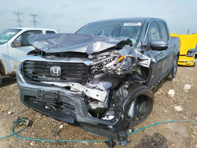 Photo 2 from auction – 2022 HONDA RIDGELINE with VIN 5FPYK3F70NB017805