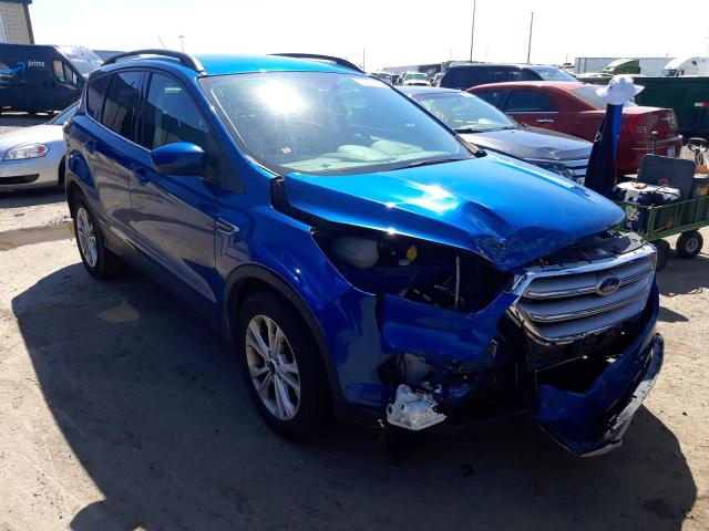 FORD ESCAPE SE 2018 with VIN 1FMCU0GD9JUA51903 - Photo from auction