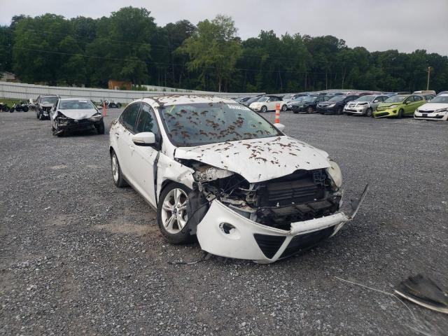 FORD FOCUS SE 2014 with VIN 1FADP3F22EL321914 - Photo from auction