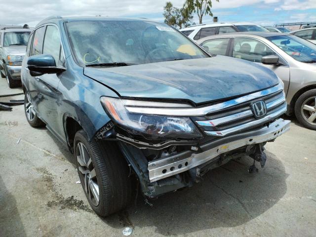 HONDA PILOT TOUR 2017 with VIN 5FNYF6H92HB052427 - Photo from auction