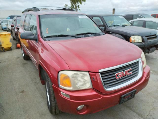 GMC ENVOY 2002 with VIN 1GKET16S526113569 - Photo from auction