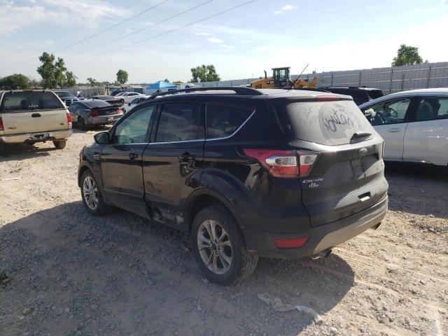 Photo 3 from auction – 2018 FORD ESCAPE SE with VIN 1FMCU0GD0JUA11807
