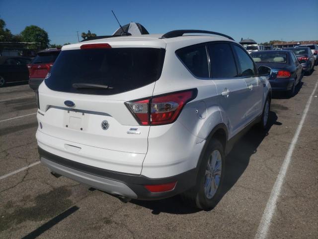Photo 4 from auction – 2018 FORD ESCAPE SE with VIN 1FMCU0GD0JUA11385