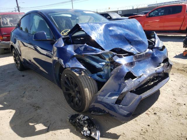 TESLA MODEL Y 2022 with VIN 7SAYGDEE0NF386604 - Photo from auction
