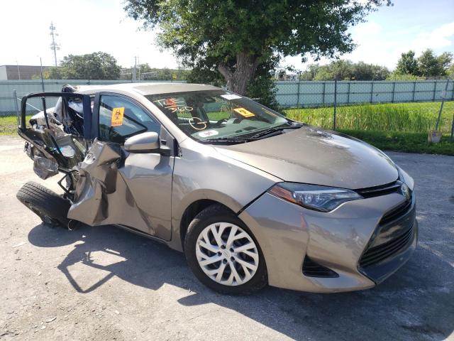 TOYOTA COROLLA L 2018 with VIN 5YFBURHE2JP765610 - Photo from auction