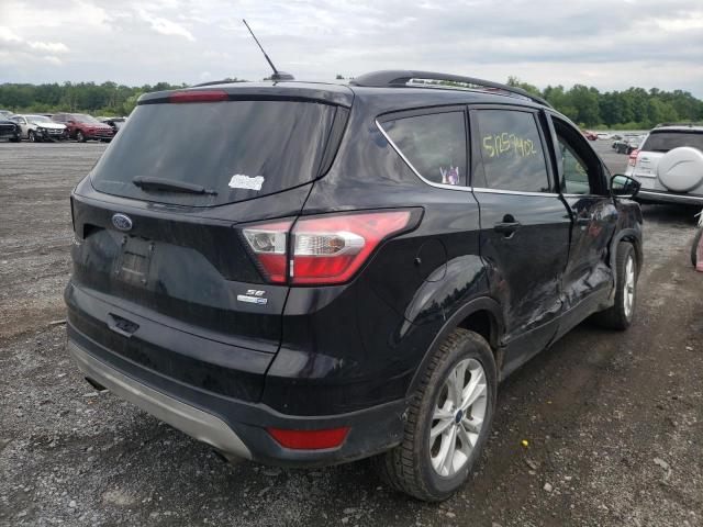 Photo 4 from auction – 2018 FORD ESCAPE SE with VIN 1FMCU9GD8JUB45615